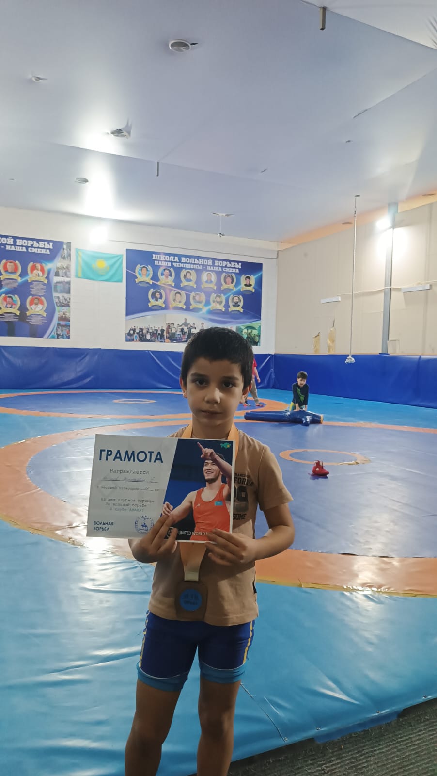 Еркін күрестен жарыста  III-орынға ие болды.